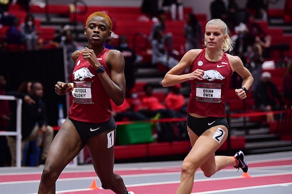 Arkansas runners Shafiqua Maloney and Quinn Owen compete in the 800 meters during the Arkansas Invitational on Friday, Jan. 14, 2022, in Fayetteville.