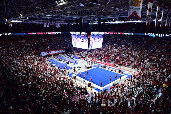 An announced crowd of 10,345 is shown during a gymnastics meet between Arkansas and Auburn on Friday, Jan. 14, 2022, at Bud Walton Arena in Fayetteville. The meet was the Razorbacks' first ever in the school's basketball arena.