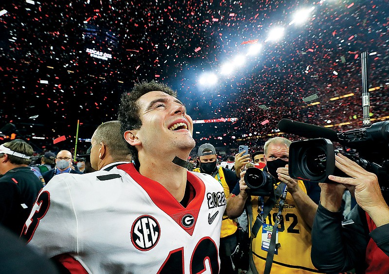 Georgia quarterback Stetson Bennett reacts to winning the College Football Playoff championship game Monday night against Alabama in Indianapolis. (The Atlanta Journal-Constitution via AP)