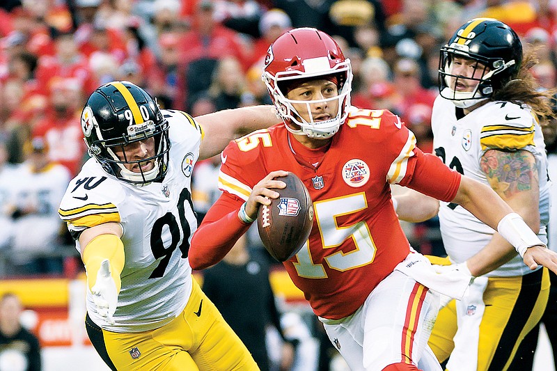 In this Dec. 26, 2021, file photo, Steelers outside linebacker T.J. Watt chases Chiefs quarterback Patrick Mahomes during a game at Arrowhead Stadium. (Associated Press)