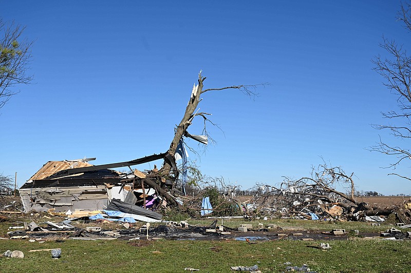 A house lies on its roof in Monette, yards from its foundation, on Sunday, Dec. 12, 2021, after storms late Dec. 10 and early Dec. 11 spawned dozens of tornadoes in five states. (Arkansas Democrat-Gazette/Stephen Swofford)