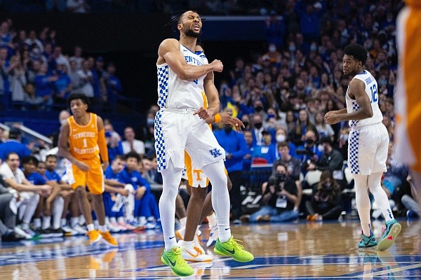 Kentucky guard Davion Mintz (10) celebrates making a three pointer during an NCAA college basketball game against Tennessee in Lexington, Ky., Saturday, Jan. 15, 2022. (AP Photo/Michael Clubb) Kentucky guard Davion Mintz (10) celebrates making a three pointer during an NCAA college basketball game against Tennessee in Lexington, Ky., Saturday, Jan. 15, 2022. (AP Photo/Michael Clubb)