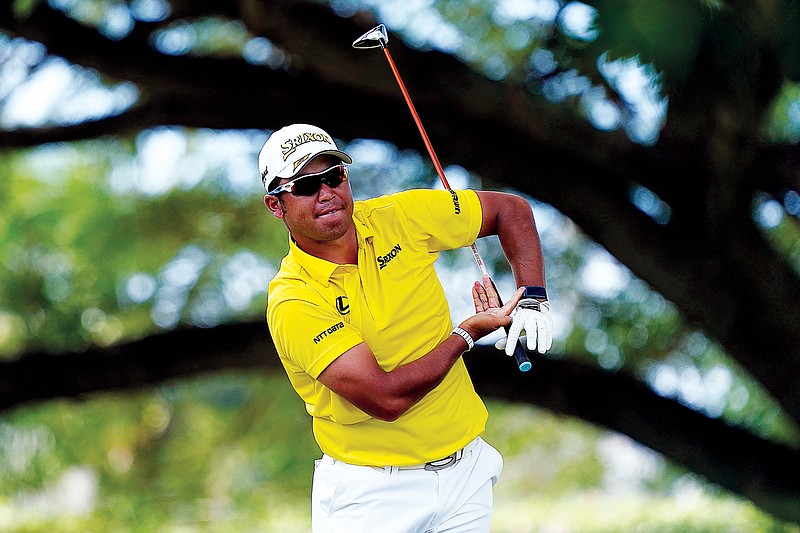 Hideki Matsuyama watches his tee shot on the second hole during Sunday’s final round of the Sony Open in Honolulu. (Associated Press)