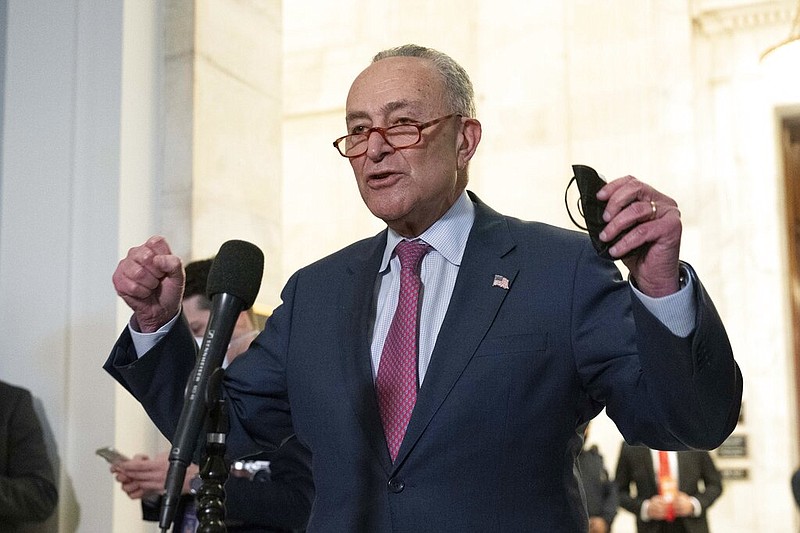 FILE - Senate Majority Leader Chuck Schumer, D-NY, speaks to the media after Senate Democrats met privately with President Joe Biden, Jan. 13, 2022, on Capitol Hill in Washington. (AP/Jose Luis Magana, File)