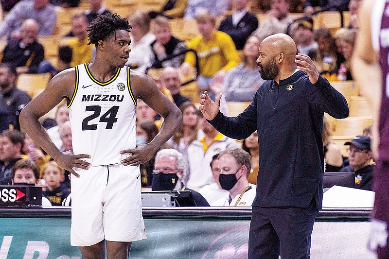 Missouri coach Cuonzo Martin talks to Kobe Brown during a timeout in the second half of Saturday’s game against Texas A&M at Mizzou Arena. (Associated Press)