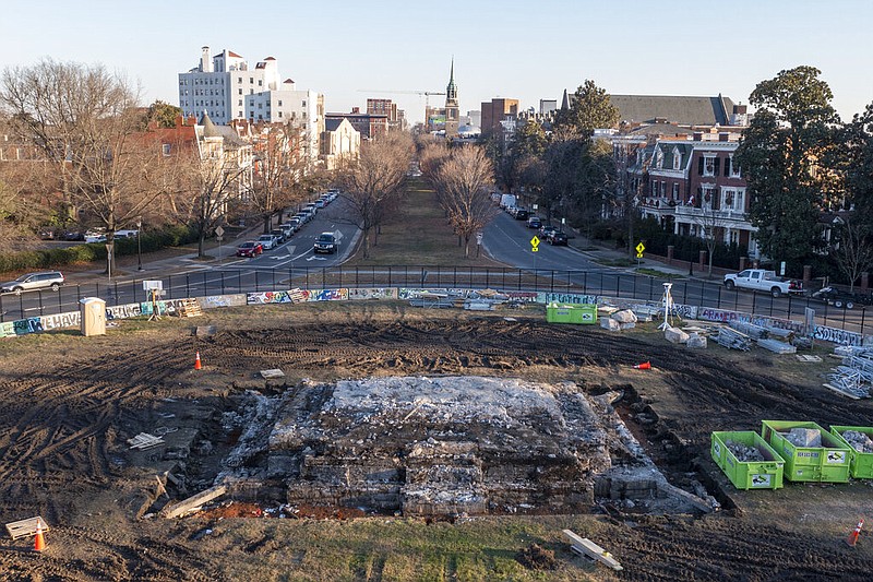 A pile of rubble is all that is left after the removal of the pedestal that once held the statue of Confederate General Robert E. Lee on Monument Avenue in Richmond, Va., in this Dec. 23, 2021, file photo. (AP/Steve Helber)