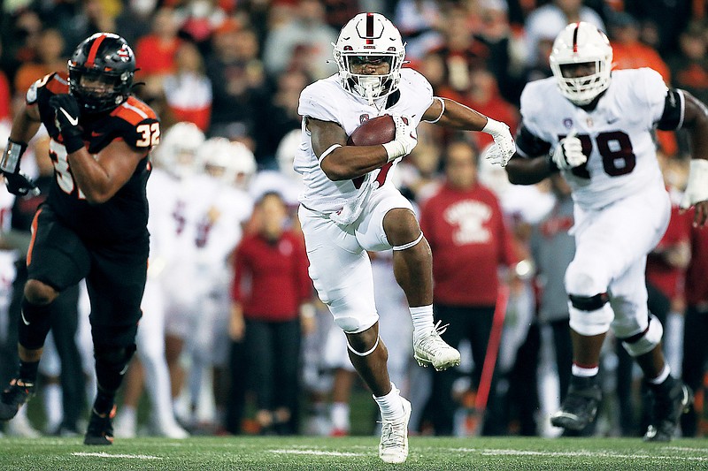 In this Nov. 13, 2021, file photo, Stanford running back Nathaniel Peat rushes 18 yards for a touchdown during the second half of a game against Oregon State in Corvallis, Ore. (Associated Press)