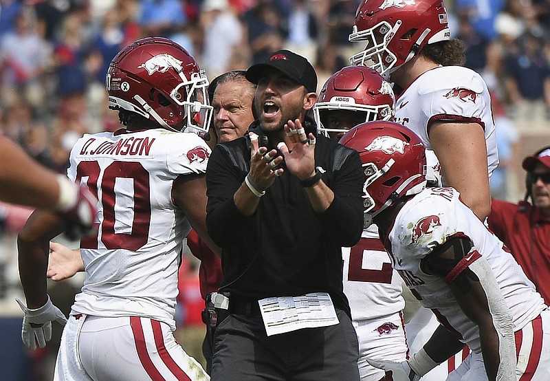 Arkansas offensive coordinator Kendal Briles reacts during the third quarter against Ole Miss on Oct. 9 at Vaught-Hemingway Stadium in Oxford, Miss. Briles reached a new deal to remain Arkansas’ offensive coordinator on Thursday after being pursued for the same job at the University of Miami.
(NWA Democrat-Gazette/Charlie Kaijo)