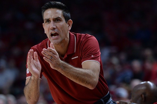 Arkansas assistant coach Gus Argenal is shown on Saturday, Dec. 4, 2021, during the second half of the Razorbacks’ 93-78 win over Arkansas-Little Rock in Bud Walton Arena in Fayetteville. Visit nwaonline.com/211205Daily/ for the photo gallery.