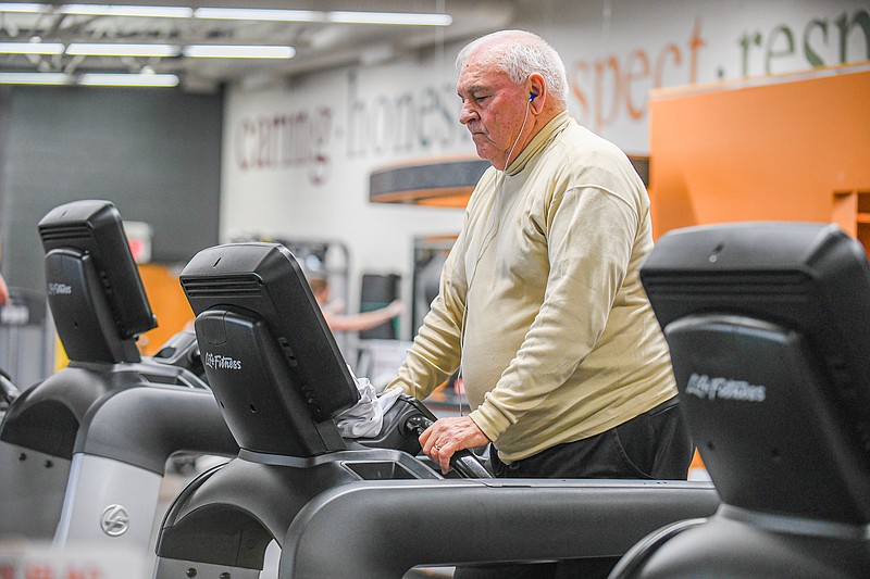 Larry Poetker walks on the treadmill Wednesday at the Hartfield YMCA on the city's west side. The facility will soon be open 24 hours a day to accomodate client need. (Julie Smith/News Tribune)