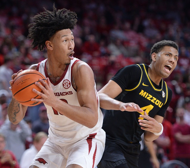 Arkansas forward Jaylin Williams grabs a rebound against Missouri on Jan. 12 at Walton Arena in Fayetteville. The Razorbacks have outrebounded their past four opponents 169-130.
(NWA Democrat-Gazette/Andy Shupe)