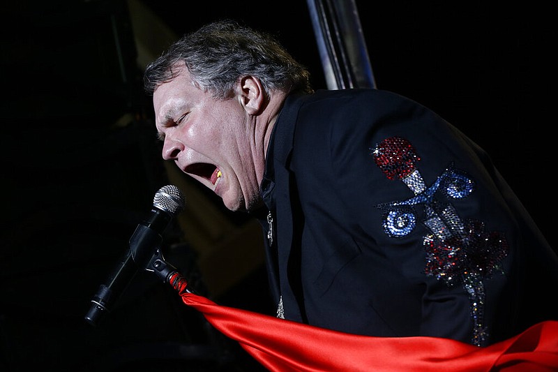 FILE - Singer Meat Loaf performs in support of Republican presidential candidate and former Massachusetts Gov. Mitt Romney at the football stadium at Defiance High School in Defiance, Ohio, Thursday, Oct. 25, 2012. (AP Photo/Charles Dharapak, File)