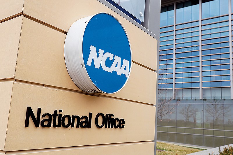 In this March 12, 2020, file photo, signage outside at the headquarters of the NCAA is viewed in Indianapolis. (Associated Press)