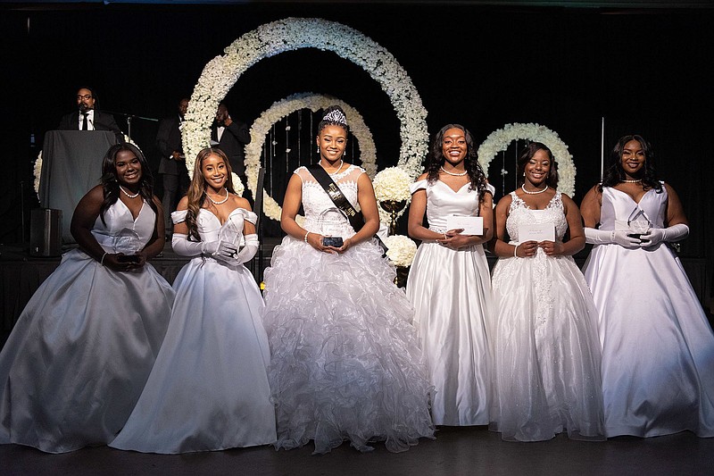 Deb 21-1.Taylor Swinton, first runner-up, Ms. Pi Lambda; Destinee Howard, second runner-up, Ms. Pi Lambda; Samia Smith, Ms Pi Lambda; Ciara Cooper, ad sales winner; Alasiah Bledsoe, ad sales runner-up; and Jennifer Ben, Ms. Congeniality, at the 71st annual Debutante Ball, presented by the Central Arkansas Sphinx Foundation and the Pi Lambda Chapter of Alpha Phi Alpha Fraternity Inc. The ball took place Dec. 18 in Governor's Hall I and II, Statehouse Convention Center in Little Rock..(Special to the Democrat-Gazette)