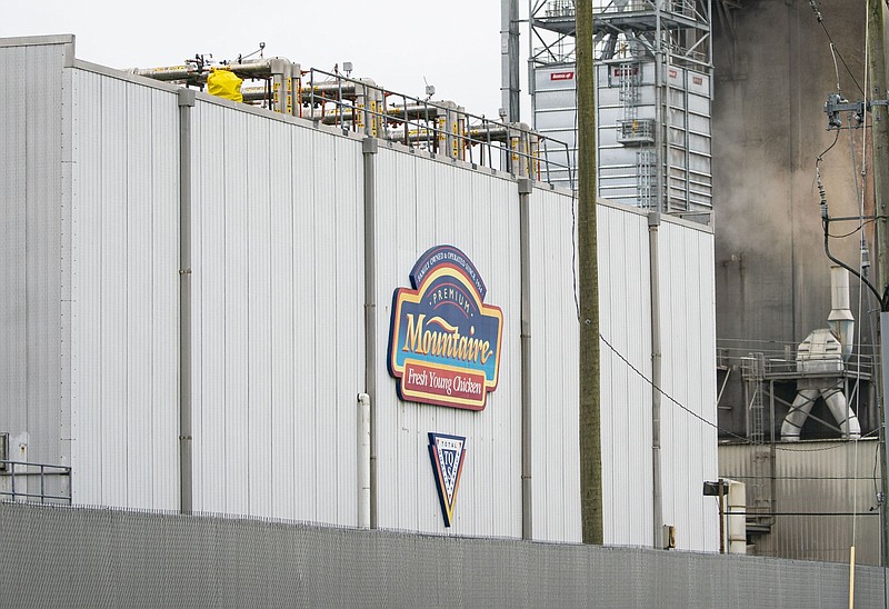 The Mountaire Farms logo is seen on a chicken processing plant in Millsboro, Del., in this undated file photo. Mountaire Farms bills itself as the fourth-largest chicken company in America. Founded by Guy Cameron and currently chaired by Ronald Cameron, Mountaire Corp. has people at facilities in Arkansas, Delaware, Maryland, Virginia and North Carolina through its operating affiliates Mountaire Farms Inc. and Mountaire Farms of Delaware Inc., according to the company's website. (Photo for The Washington Post by Al Drago)