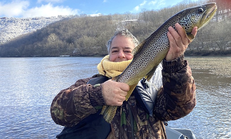 The author caught this 28-inch brown trout on a Luck-E-Strike jerkbait on the White River on Sunday near the Ranchette Access while fishing with Richard Phelan of Little Rock.
(Arkansas Democrat-Gazette)