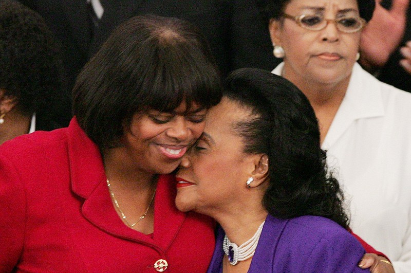 Suzan Johnson Cook (left) embraces Coretta Scott King after delivering a keynote address at The Martin Luther King, Jr. Annual Commemorative Service in the Ebenezer Baptist Church, Heritage Sanctuary, in Atlanta in 2005. Cook, who was befriended and mentored by King, will deliver the sermon Sunday for Theressa Hoover Memorial United Methodist Church in Little Rock.
(AP/Ric Feld)