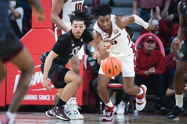 Arkansas wing Stanley Umude (0) sprints to get a rebound on Saturday, January 22, 2022 during the second half of a basketball game at Walton Arena in Fayetteville. Check out nwaonline.com/220123Daily/ for the photo gallery.