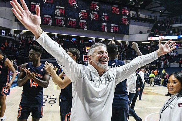 Auburn coach Bruce Pearl celebrates a win over Mississippi after an NCAA college basketball game in Oxford, Miss., Saturday, Jan. 15, 2022. (AP Photo/Bruce Newman)