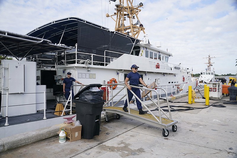 Crew members of the Coast Guard cutter William Flores get ready to go on patrol Wednesday in Miami Beach, Fla.
(AP/Marta Lavandier)