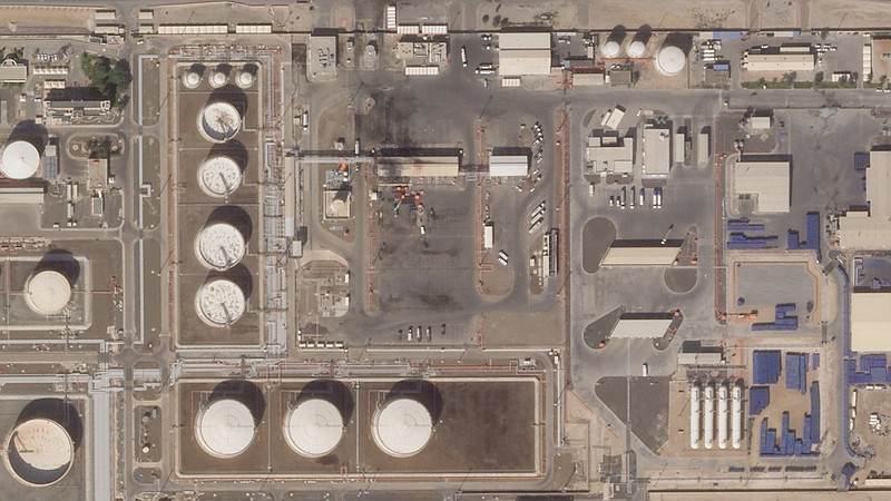 This satellite image shows the aftermath of an attack claimed by Yemen’s Houthi rebels on an Abu Dhabi National Oil Co. fuel depot Saturday in the Mussafah neighborhood of Abu Dhabi, United Arab Emirates.
(AP/Planet Labs PBC)