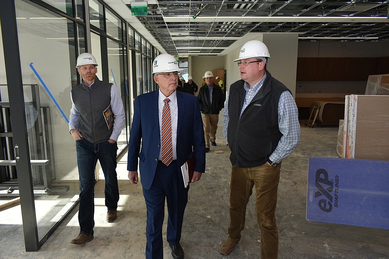 U.S. Sen. John Boozman (center) takes a tour of the Relyance Bank headquarters under construction Wednesday in White Hall. He was joined by Relyance Chief Information Officer Andy Jenkins (left) and company President Scott Pittillo. 
(Pine Bluff Commercial/I.C. Murrell)