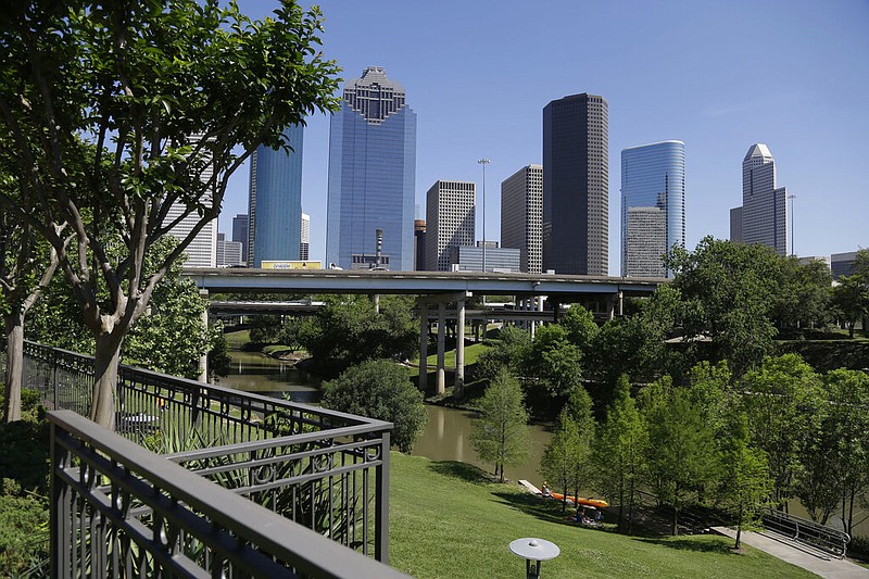 The Houston skyline is shown from the Buffalo Bayou in this April 2014 file photo. Murphy Oil Corp., formerly based in El Dorado, moved its headquarters to Houston in 2020. (AP/Pat Sullivan)