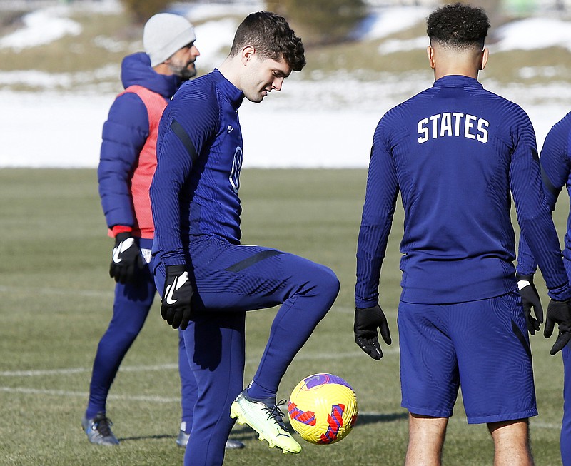 U.S. men's national team soccer Christian Pulisic (left) talks with teammate Tyler Adams during practice Wednesday in Columbus, Ohio. (Associated Press)