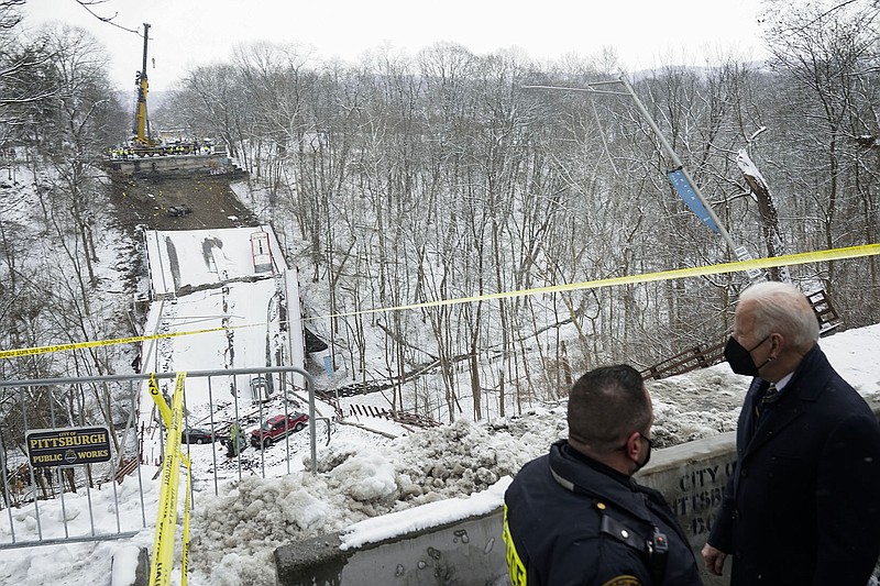 President Joe Biden views the collapsed bridge Friday in Pittsburgh. “The idea that we’ve been so far behind on infrastructure for so many years, it’s mind boggling,” he said.
(AP/Andrew Harnik)