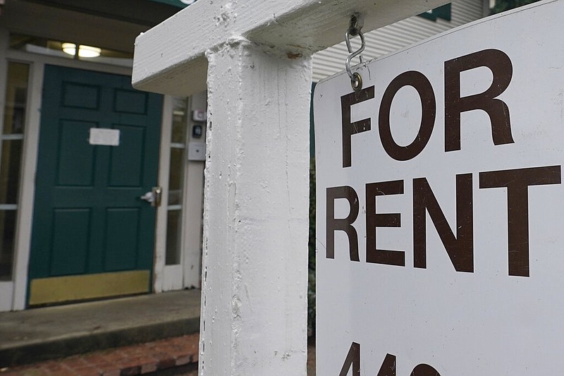 A For Rent sign is posted on a residence for rent in this undated file photo. (AP/Rich Pedroncelli)