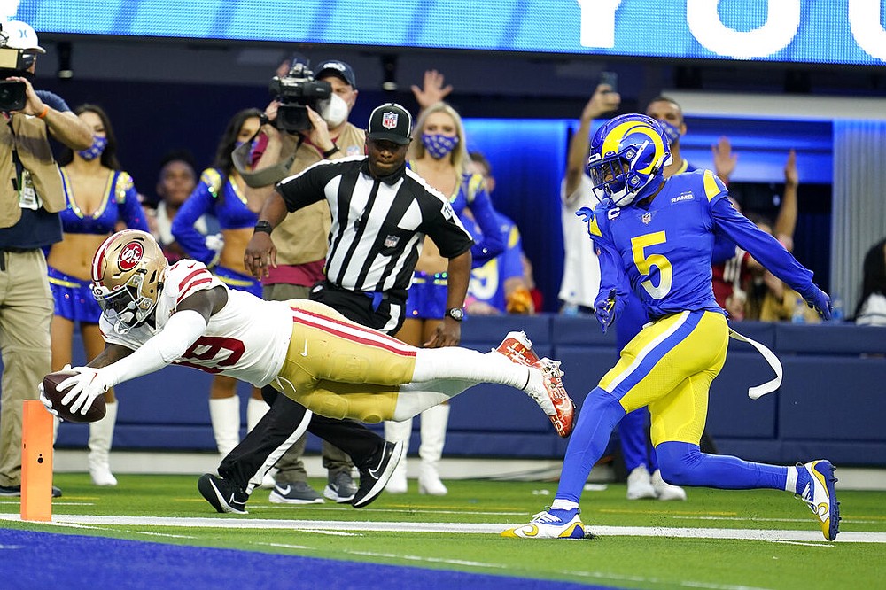 Rams storm back to put away 49ers