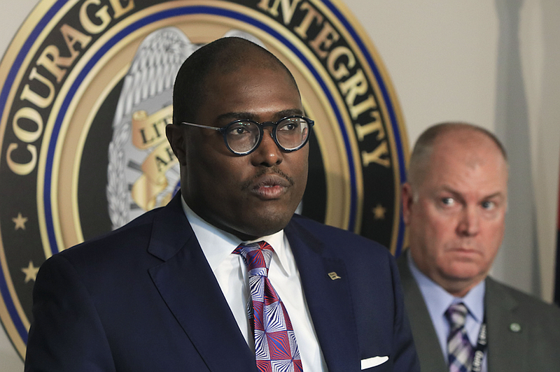 FILE — Mayor Frank Scott, Jr., left, speaks during a news conference at Little Rock Police Department headquarters.