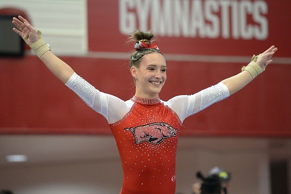 Arkansas’ Kennedy Hambrick competes Friday, Jan. 7, 2022, in the vault portion of the Razorbacks’ match with Ohio State in Barnhill Arena in Fayetteville. Visit nwaonline.com/220108Daily/ for the photo gallery.