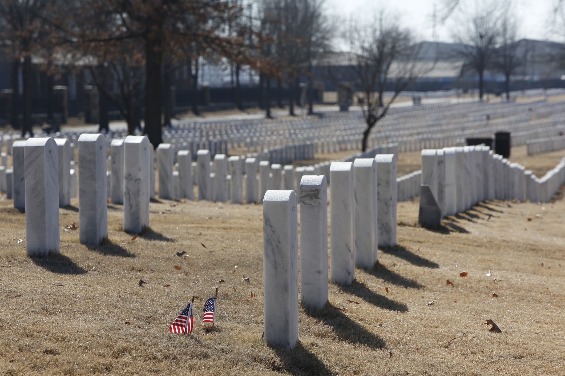 Grass fire damages headstones at Fort Smith National Cemetery - Vimarsana News