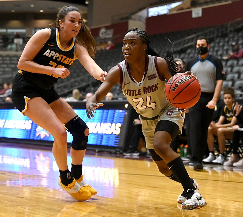 UALR’s Mayra Caicedo (24)has been a spark for the Trojans this season, helping to lead on both sides of the ball. The senior point guard is one of five UALR players who played last season who is also a part of the rotation this season.
(Arkansas Democrat-Gazette/Stephen Swofford)