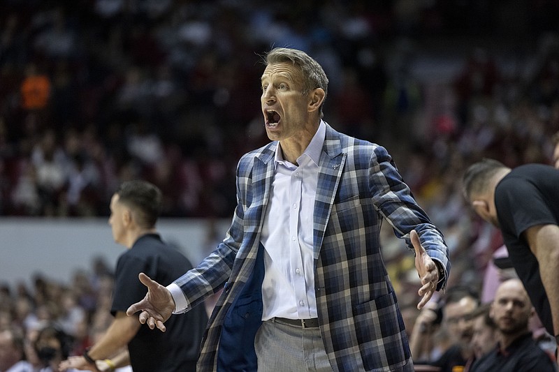 Alabama head coach Nate Oats argues with the referees during the second half of an NCAA college basketball game against Arkansas, Saturday, Feb. 12, 2022, in Tuscaloosa, Ala. (AP Photo/Vasha Hunt)