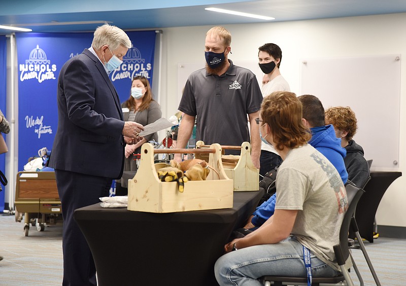 Gov. Mike Parson visits with staff and students in March 2021 at Nichols Career Center during a visit to the Jefferson City center. (Julie Smith)