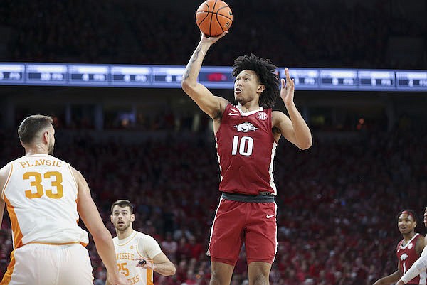 Arkansas forward Jaylin Williams attempts a shot during a game against Tennessee on Saturday, Feb. 19, 2022, in Fayetteville.