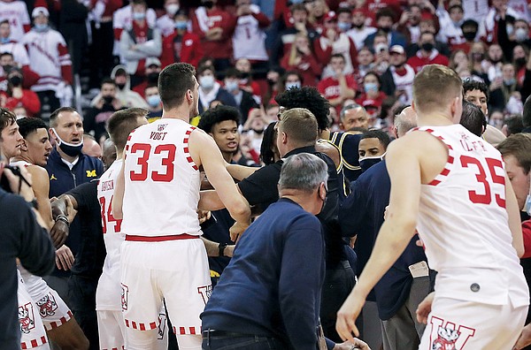 Michigan's Howard hits Wisconsin assistant after a loss - Vimarsana News