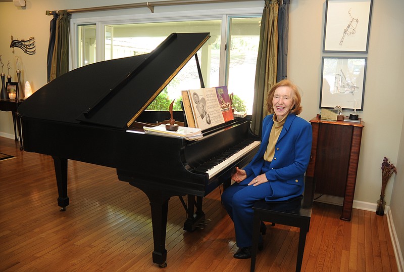 Helen Selig sits at the piano in her home in March 2012. - File photo by The Sentinel-Record