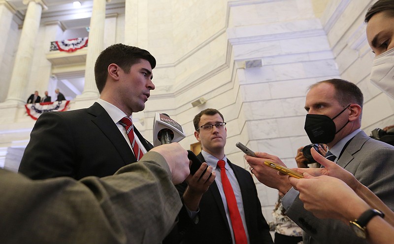 U.S. Senate candidate Jake Bequette answers questions from reporters during the first day of candidate filing on Tuesday, Feb. 22, 2022, at the state Capitol in Little Rock. .(Arkansas Democrat-Gazette/Thomas Metthe)