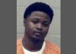 Suspect in homicide surrenders to police