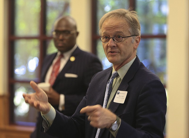 Central Arkansas Library System Executive Director Nate Coulter speaks during an education roundtable event organized by Little Rock Mayor Frank Scott Jr. (background) in this Sept. 9, 2019, file photo. (Arkansas Democrat-Gazette/Staton Breidenthal)