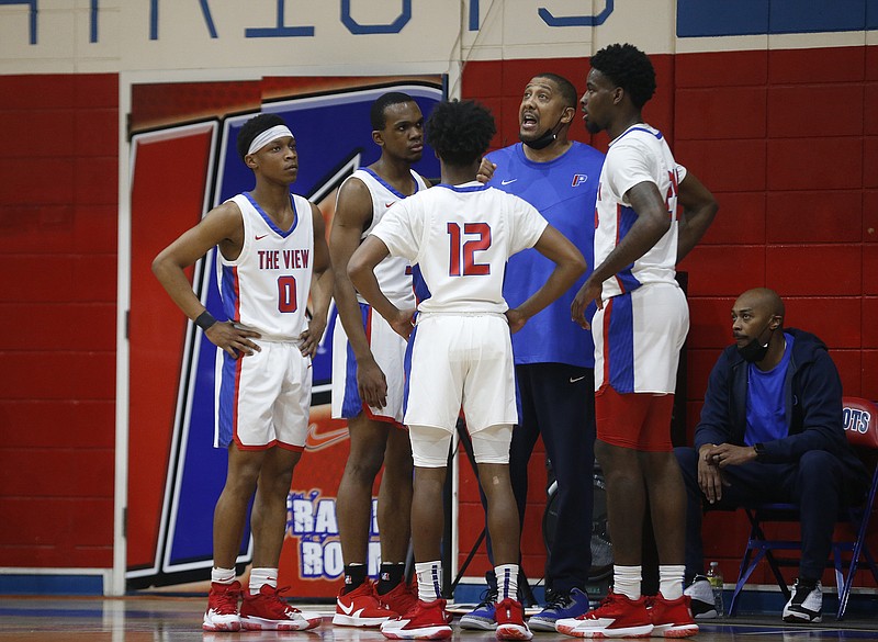 Little Rock Parkview head coach Scotty Thurman talks to his players during a timeout in the first quarter of Parkview's 89-87 on Friday, Feb. 25, 2022, at Parkview High School in Little Rock.