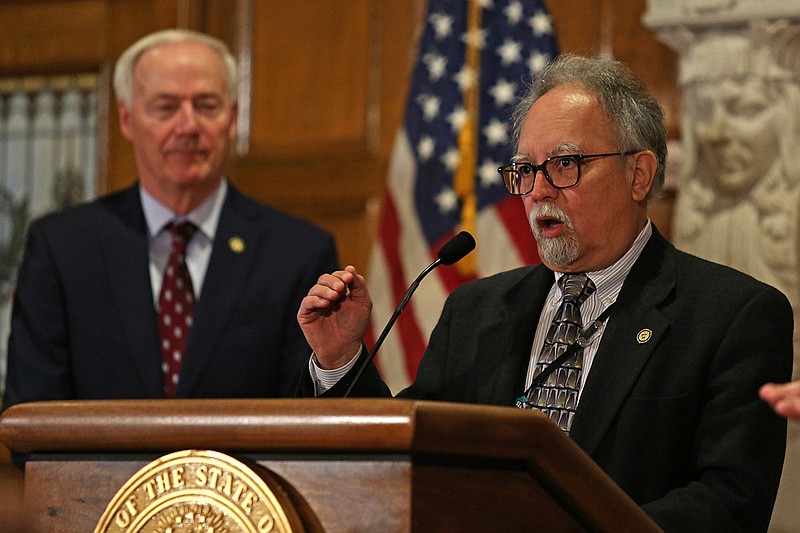 State Health Secretary Jose Romero speaks at Gov. Asa Hutchinson’s briefing Friday at the state Capitol after the U.S. Centers for Disease Control and Prevention announced relaxed guidelines for masks in areas with low or medium levels of covid-19.
(Arkansas Democrat-Gazette/Colin Murphey)