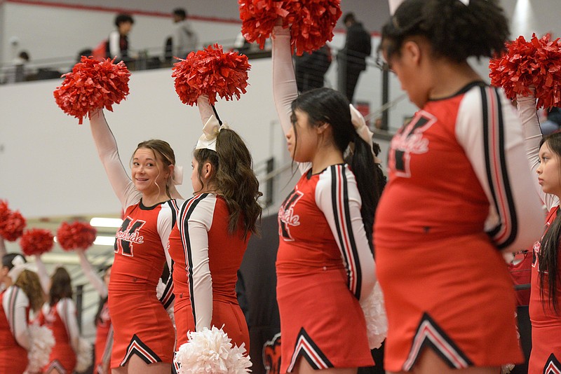 FILE — Cheerleaders for Fort Smith Northside perform on Tuesday, Feb. 22, 2022, during the first quarter of the Conway Lady Wampus Cats' 61-47 win at Grizzly Arena in Fort Smith. (NWA Democrat-Gazette/Hank Layton)