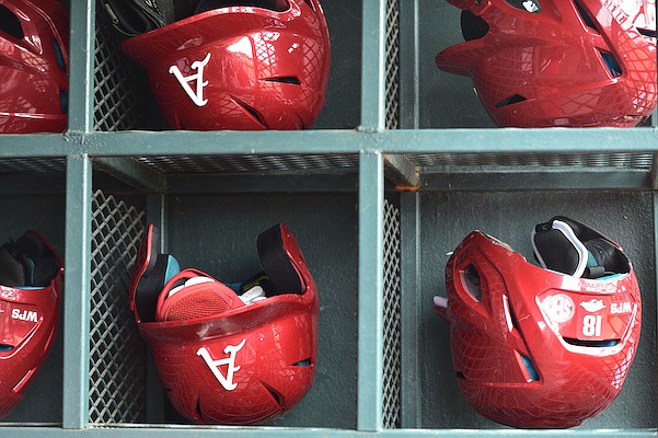 Arkansas batting helmets are shown in the dugout prior to a game against Indiana on Friday, Feb. 25, 2022, in Round Rock, Texas.