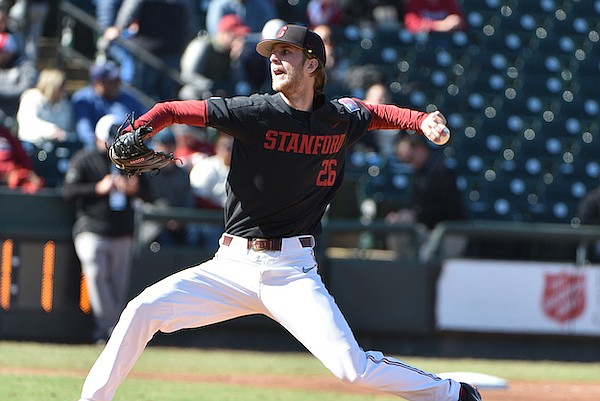 Stanford pitcher Quinn Mathews throws during a game against Arkansas on Sunday, Feb. 27, 2022, in Round Rock, Texas.