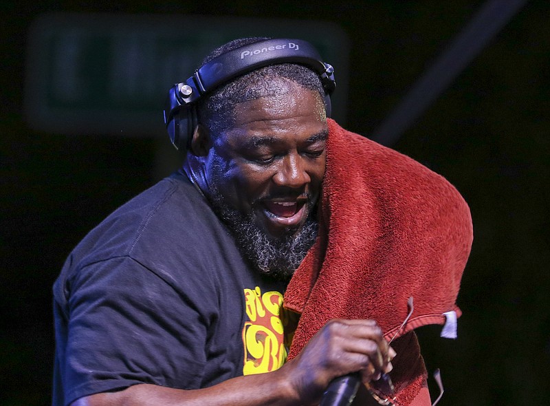 DJ Curtis Davis, with Dope A** Sneakers, wipes his face of sweat as he is introduced in the middle of a performance during a 2021 Thursday Night Live.