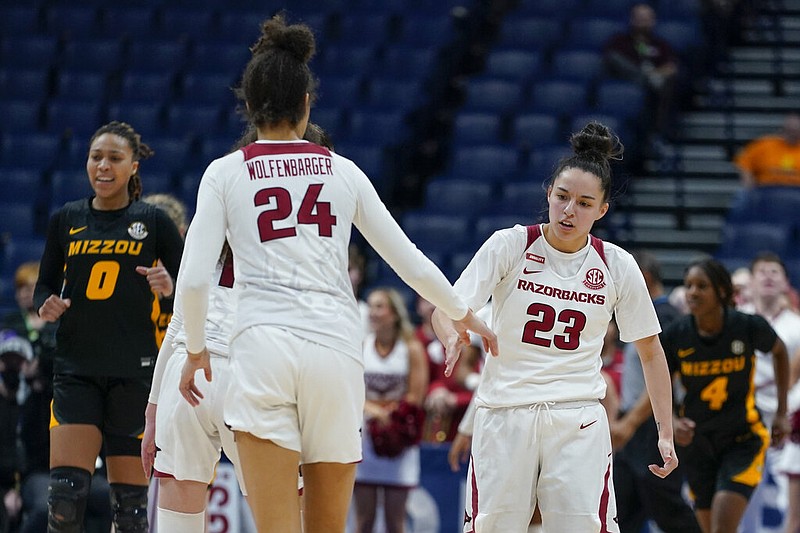 Arkansas' Amber Ramirez (23) celebrates with Jersey Wolfenbarger (24) after scoring against Missouri in the second half of an NCAA college basketball game at the women's Southeastern Conference tournament in Nashville, Tenn., on Thursday, March 3, 2022. Arkansas won in overtime 61-52. (AP/Mark Humphrey) Arkansas' Amber Ramirez (23) celebrates with Jersey Wolfenbarger (24) after scoring against Missouri in the second half of an NCAA college basketball game at the women's Southeastern Conference tournament in Nashville, Tenn., on Thursday, March 3, 2022. Arkansas won in overtime 61-52. (AP/Mark Humphrey)